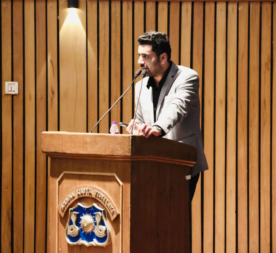 A student asking a question during the session